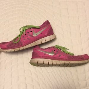Nike green and pink running shoes size 7.5